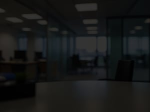 desk-with-glass-wall-plant-foreground